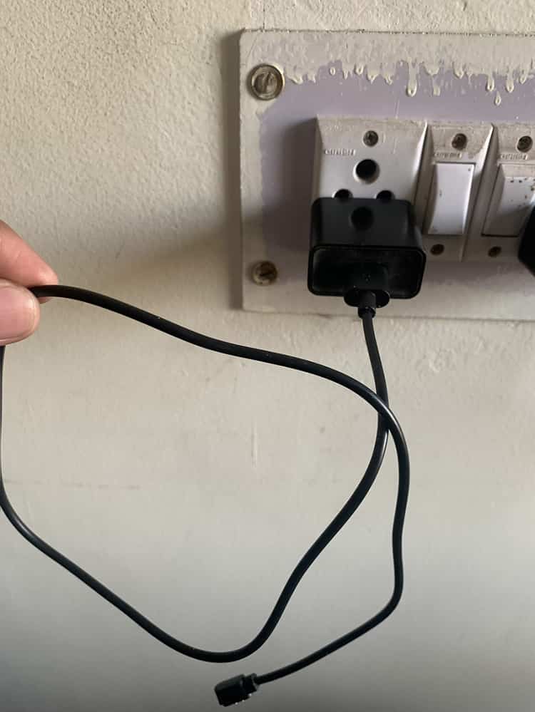 Plug the Adaptor to Electrical Socket for charging noise ColorFit Pulse Buzz